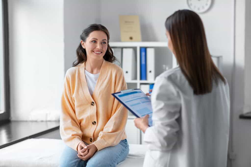 A woman recieving medication assisted treatment for MAT NJ with her primary care psycician.